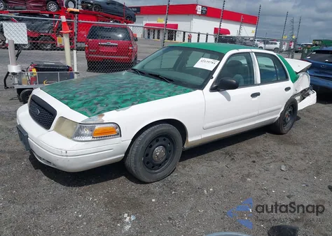 2004 Ford Crown Victoria Police z USA, uszkodzony, nr VIN 2FAFP71W54X149017